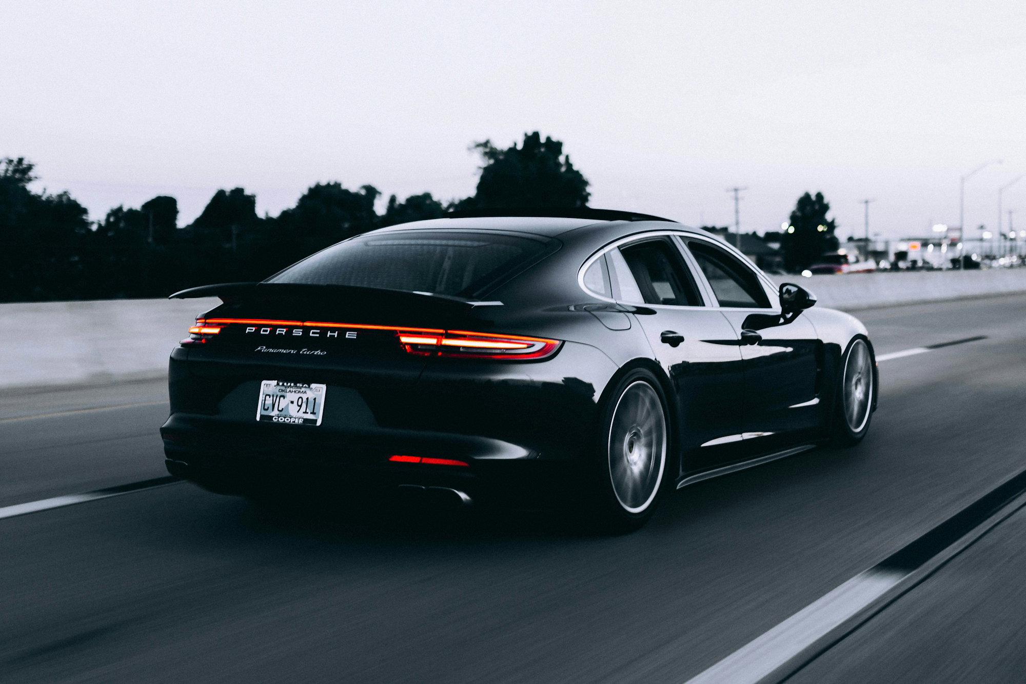 running-black-porsche-sedan.jpg running black Porsche sedan