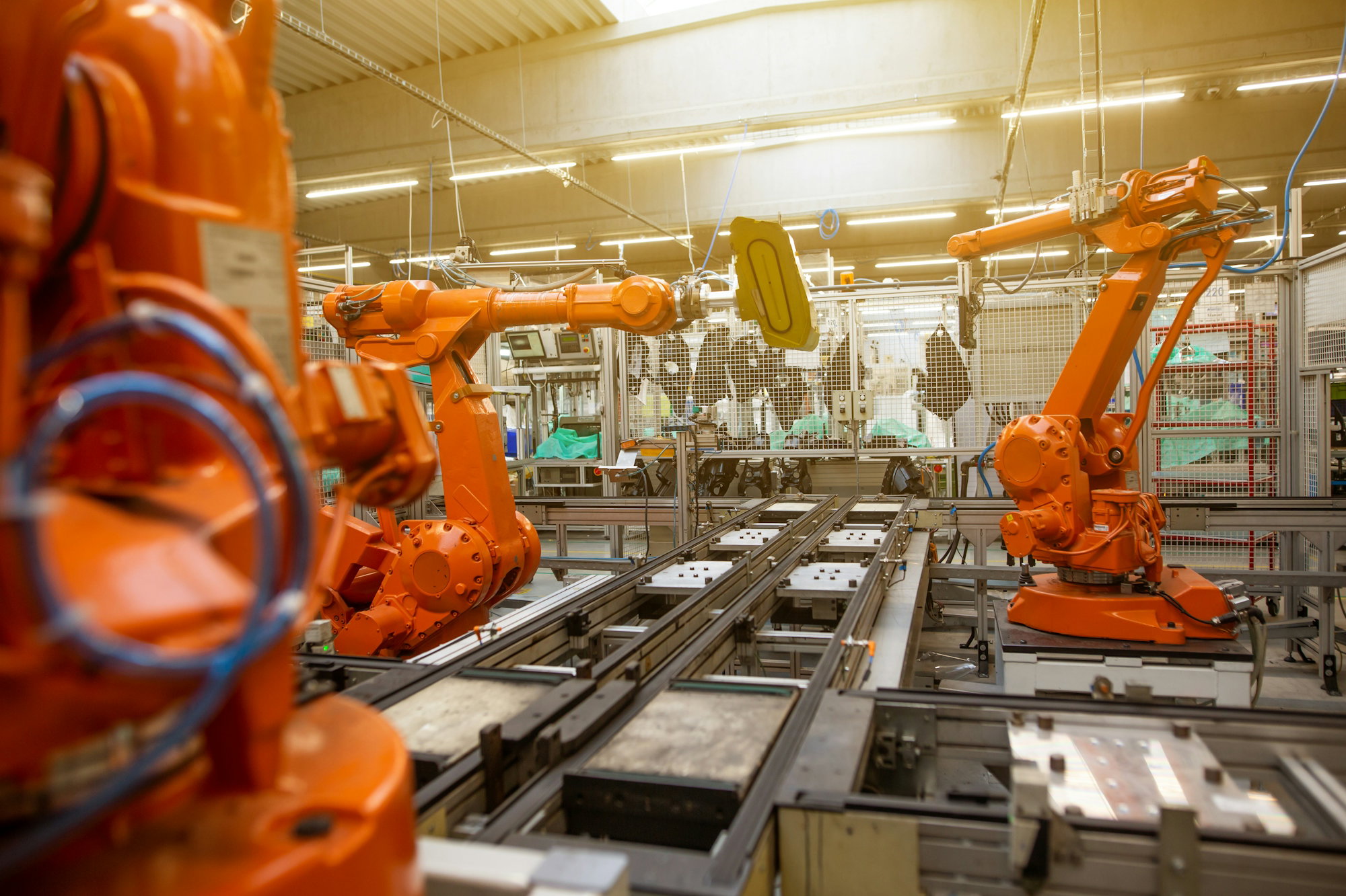 a-factory-filled-with-lots-of-orange-machines.jpg a factory filled with lots of orange machines